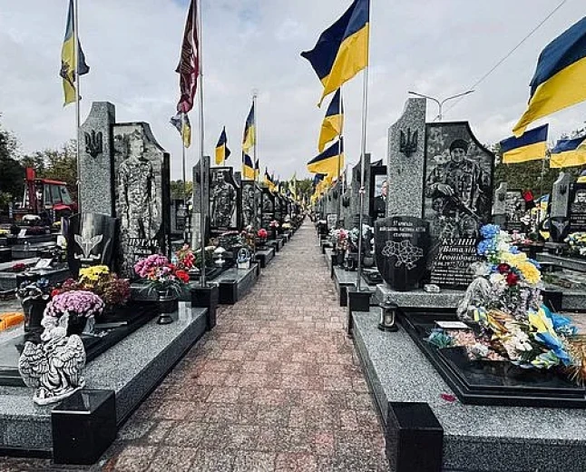 Russian inscription on soldier's grave in Ukraine stirs language debate